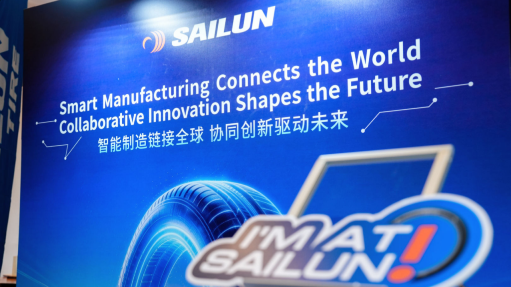 Sailun Group exhibition backdrop reading "Smart Manufacturing Connects the World Collaborative Innovation Shapes the Future" at NEV Summit 2026. (Photo: Sailun Group/LinkedIn)