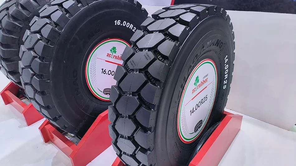 ZC Rubber Chao Yang 16.00R25 and 14.00R25 OTR mining tyres on display stands at the Mining Indonesia 2026 exhibition booth. (Photo: ZC Rubber)