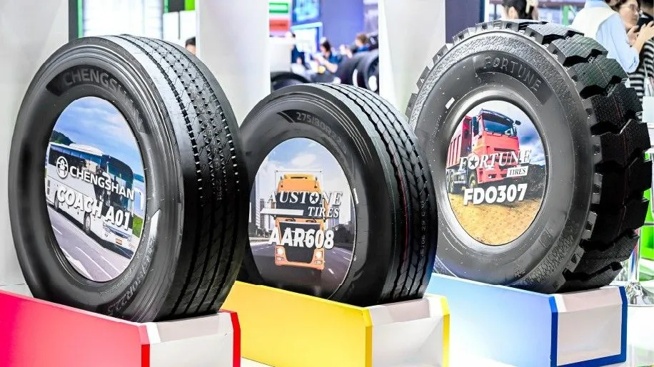 Commercial vehicle tyres from Chengshan, Austone, and Fortune displayed side-by-side on stand mounts at CITEXPO 2026. (Photo: Prinx Chengshan)